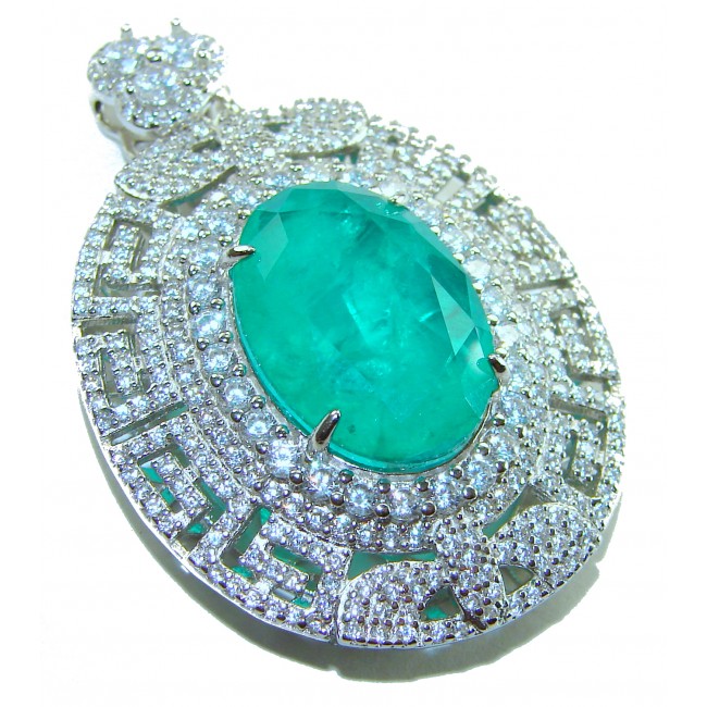 Luxurious 18.5 carat Emerald White Sapphire .925 Sterling Silver handcrafted pendant - Emerald and sapphire pendant close-up, showcasing gemstone details.