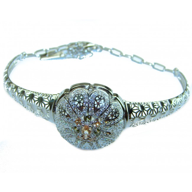 Aphrodite - Solid 2.5 multicolor Sapphire .925 Sterling Silver handcrafted Bracelet - Front view of Aphrodite silver bracelet with floral design and sapphires.