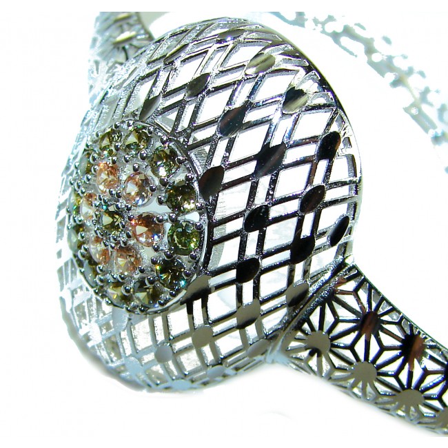 Aphrodite - Solid 4.5 multicolor Sapphire .925 Sterling Silver handcrafted Bracelet - Close-up of multicolor sapphire detail in sterling silver jewelry piece.