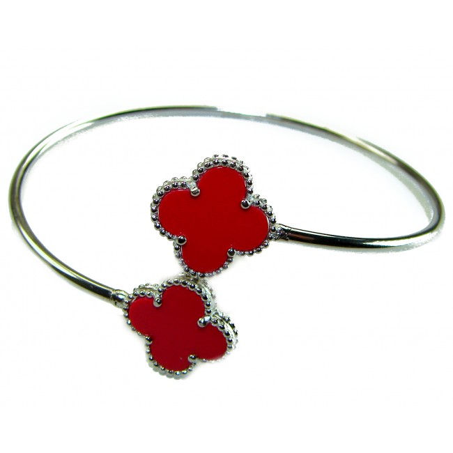 A Red four-leaf clover Coral .925 Sterling Silver handcrafted Bracelet - Red four-leaf clover bracelet, angled view, sterling silver details.
