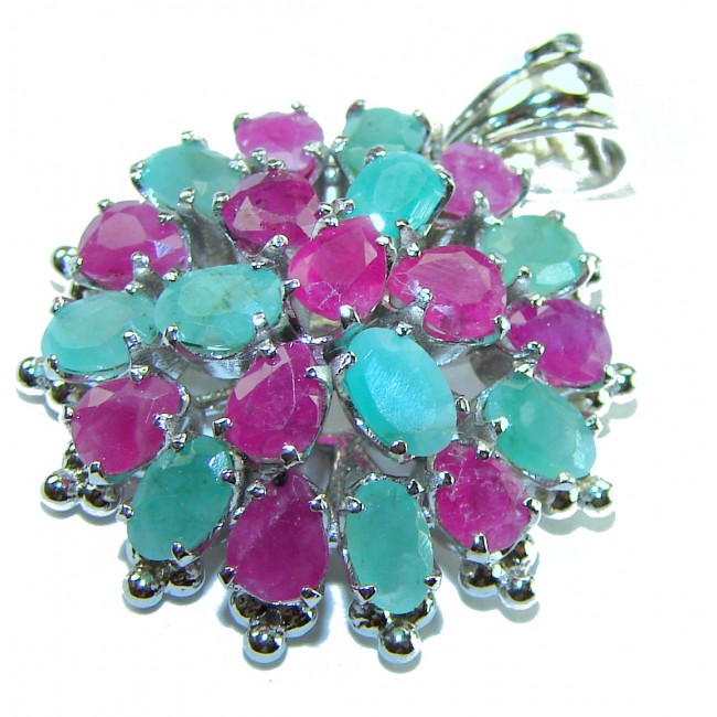 Circle of Life 22.2 carat authentic Ruby Emerald .925 Sterling Silver handmade Pendant - Close-up of a vibrant ruby and emerald pendant in silver setting.