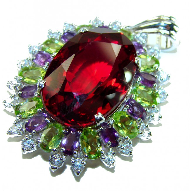 Victorian style 28.5 carat Authentic Ruby .925 Sterling Silver handcrafted Pendant - Close-up of 28.5 carat ruby pendant with colorful gemstone accents