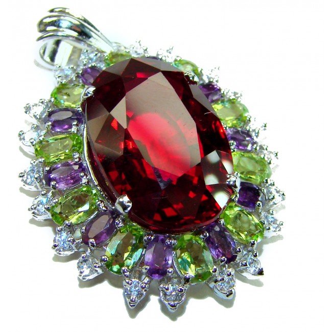 Victorian style 28.5 carat Authentic Ruby .925 Sterling Silver handcrafted Pendant - Close-up of Victorian style ruby pendant with multicolored stones.
