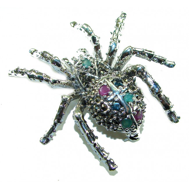 Large Black Widow Spider genuine Ruby .925 Sterling Silver handmade Pendant - Brooch - Top view of spider-shaped sterling silver brooch with rubies and gems.