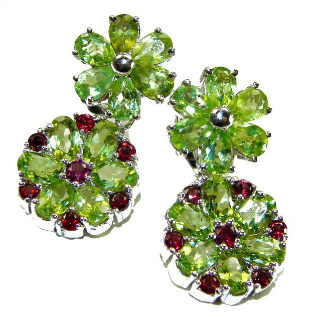 Mint Whisper - Great Masterpiece 32.2 carat genuine Peridot .925 Sterling Silver handmade Statement earrings - Close-up of Mint Whisper earrings with peridot and red gemstones.