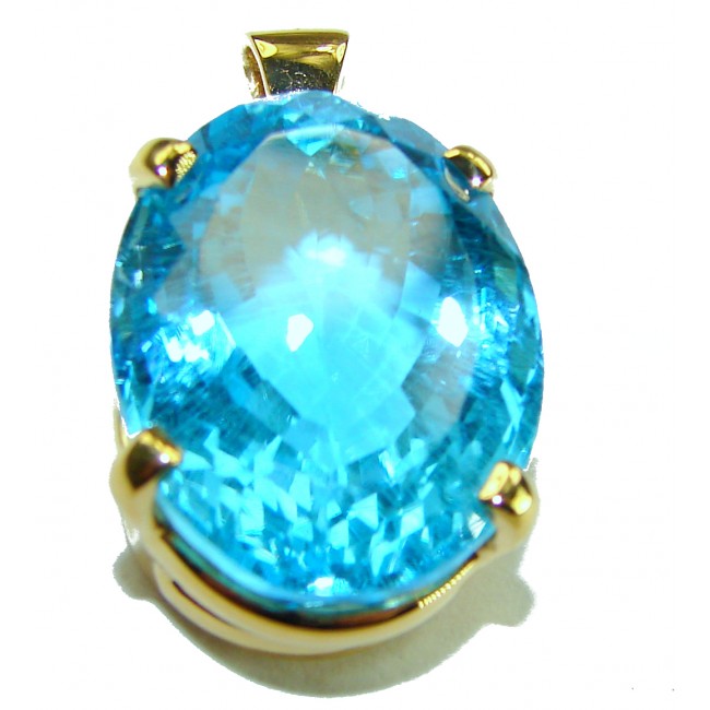 Atlantica oval cut 25.9 carat Swiss Blue Topaz 18K Gold over .925 Sterling Silver Handcrafted Pendant