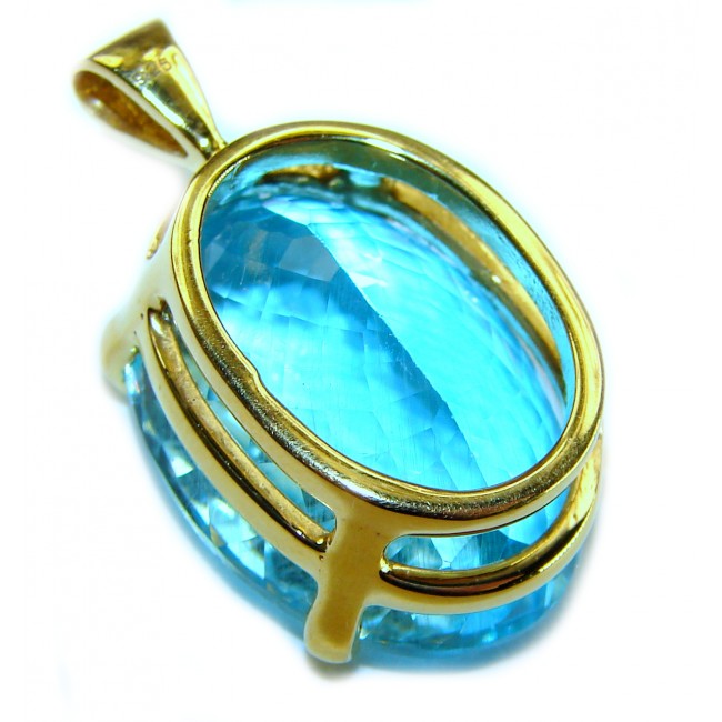 Atlantica oval cut 25.9 carat Swiss Blue Topaz 18K Gold over .925 Sterling Silver Handcrafted Pendant