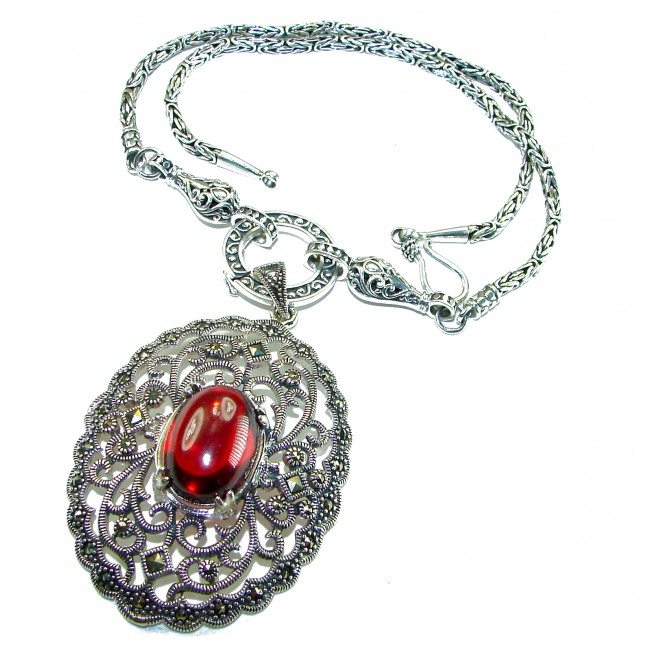 SPECTACULAR- Vintage Style- Outstanding quality - 14.5 carat Ruby .925 Sterling Silver handcrafted Statement necklace - Vintage-style necklace with ornate pendant and red stone, top view.
