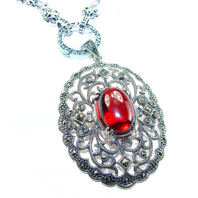 SPECTACULAR- Vintage Style- Outstanding quality - 14.5 carat Ruby .925 Sterling Silver handcrafted Statement necklace - Close-up of ornate silver necklace with red gemstone.
