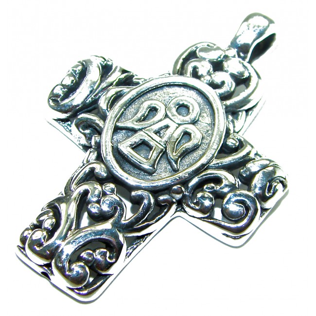 Protective angel - Holy Cross .925 Sterling Silver Pendant - Ornate silver cross pendant with angel detail, overhead view.