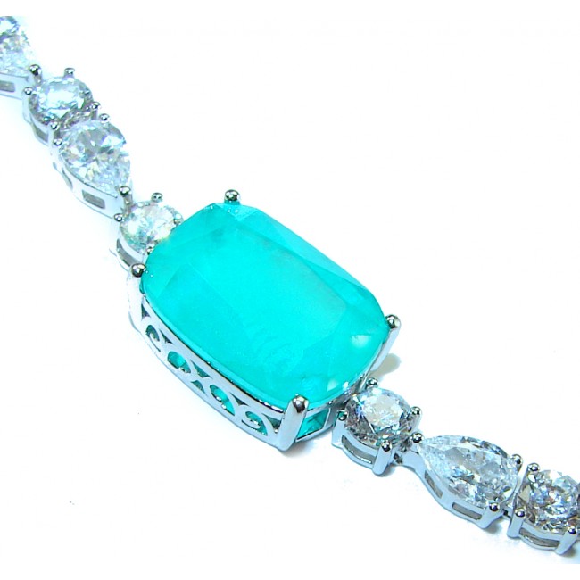 Born to Glam authentic 7.9 carat Colombian Emerald .925 Sterling Silver handcrafted Statement Bracelet - Close-up of Colombian Emerald bracelet with clear gemstones.