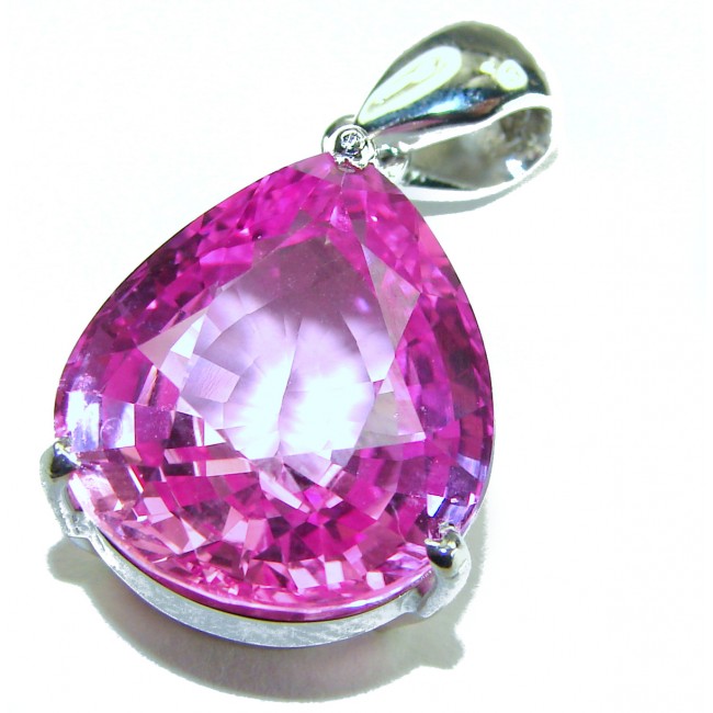 Pink Beauty - Oval cut 18.4 carat Pink Sapphire .925 Sterling Silver handcrafted pendant - Close-up of Pink Beauty oval-cut 18.4 carat pink sapphire pendant