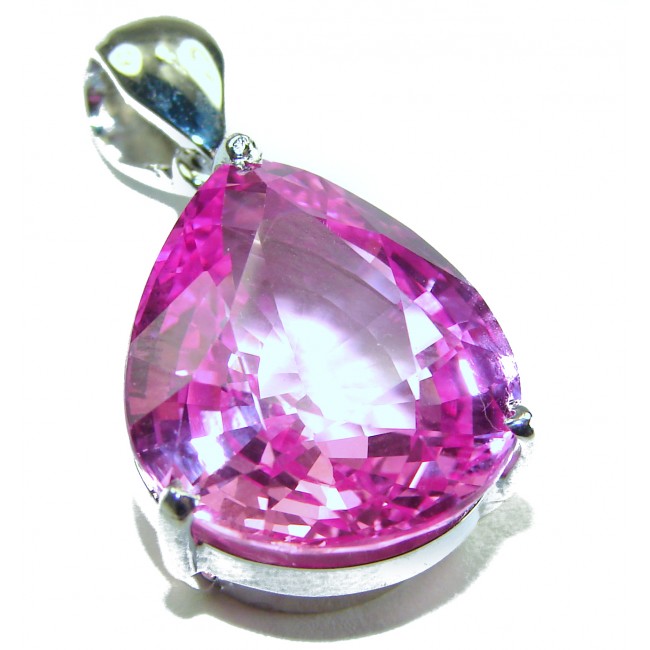 Pink Beauty - Oval cut 18.4 carat Pink Sapphire .925 Sterling Silver handcrafted pendant - Close-up of oval cut pink sapphire pendant in silver setting