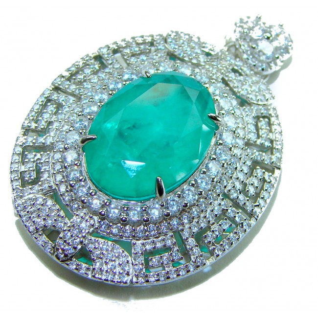 Luxurious 18.5 carat Emerald White Sapphire .925 Sterling Silver handcrafted pendant - Emerald and sapphire pendant close-up, showcasing intricate design details.