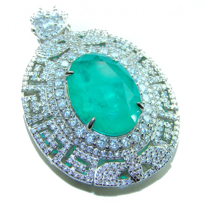 Luxurious 18.5 carat Emerald White Sapphire .925 Sterling Silver handcrafted pendant - Close-up of luxurious emerald and white sapphire pendant in sterling silver.