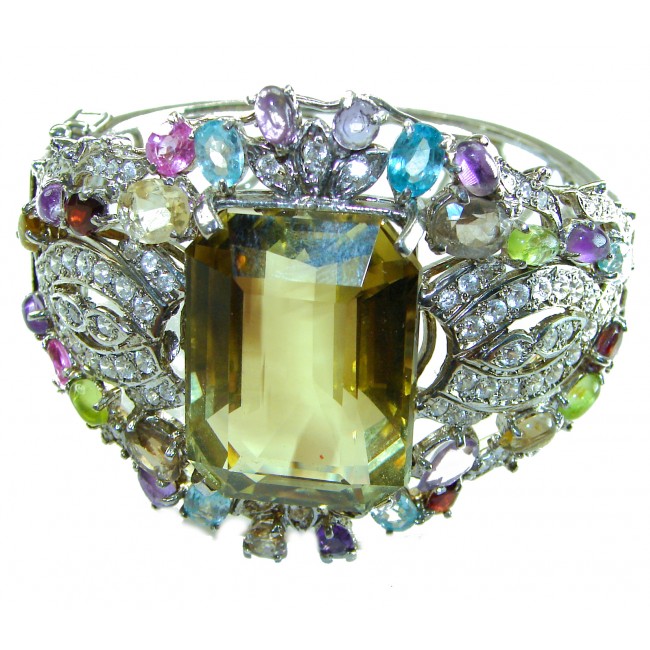 Ulimate Luxury - Large 72.5 carat Lemon Quartz .925 Sterling Silver handmade Statement Bracelet / Cuff - Close-up of multicolored gemstone bracelet with large lemon quartz centerpiece.