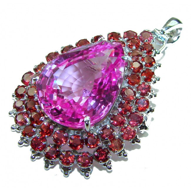 Royal Jewel - Blooming Garden - 42.5 CARAT Pink Sapphire .925 Sterling Silver handmade Pendant - Pink Sapphire pendant, top view, encircled by red stones.