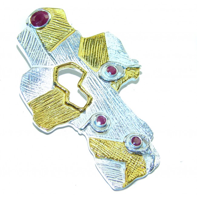 Holy Cross 1.2 carat Ruby 14K Gold over .925 Sterling Silver Pendant - Textured cross pendant with rubies and gold accents on silver, angled view.