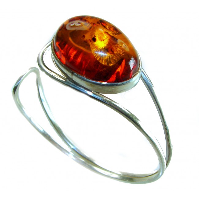 Classy Design Genuine BEST QUALITY Baltic Amber .925 Sterling Silver handamde Bracelet / Cuff - Side view of a sterling silver bracelet with Baltic amber stone.