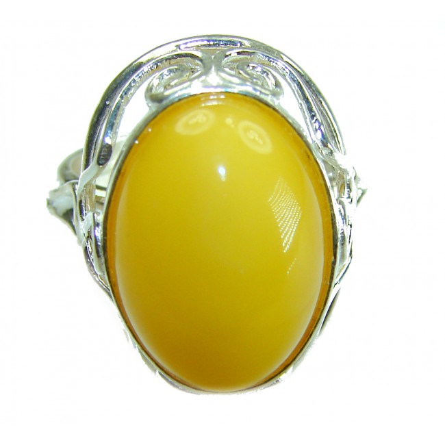 Authentic Golden Butterscotch Baltic Amber .925 Sterling Silver entirely handcrafted ring; s. 8 - Close-up of golden butterscotch Baltic amber ring in sterling silver.
