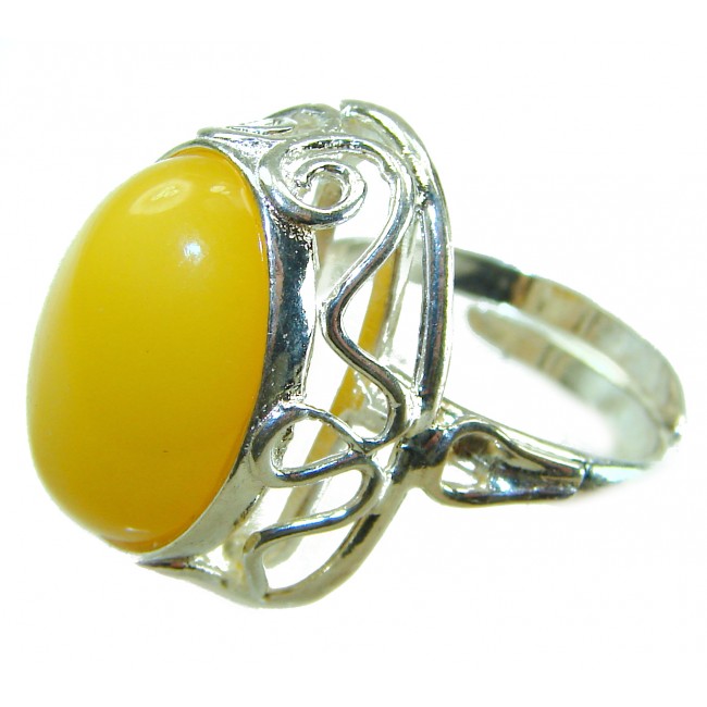 Authentic Golden Butterscotch Baltic Amber .925 Sterling Silver entirely handcrafted ring; s. 8 - Side view of silver ring with golden butterscotch amber stone.