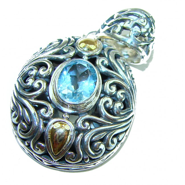Atlantica oval cut 5.9 carat Swiss Blue Topaz 14K Gold over .925 Sterling Silver Handcrafted Pendant