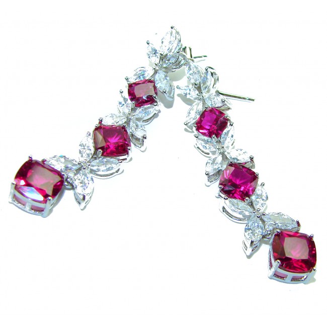 Royalty 12.2 carat Mozambique Ruby .925 Sterling Silver .925 Sterling Silver Statement earrings - Elegant ruby and silver earrings, top-down view showing gems and design.