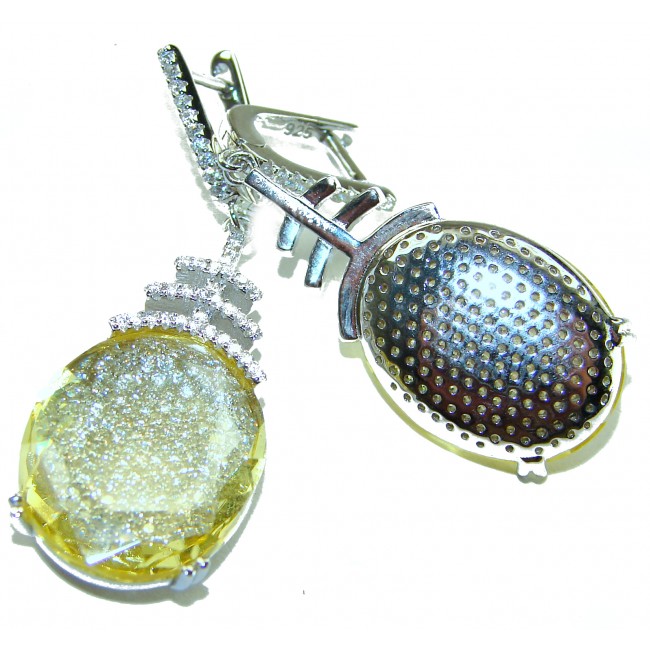 Costa del Sol 22.8 carat Lemon Quartz rhodium over .925 Sterling Silver handcrafted Statement Earrings - Close-up of Costa del Sol Lemon Quartz earrings with 925 silver details.