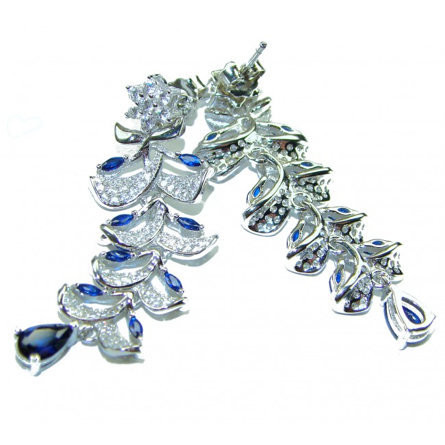 Classy Beauty 10.2 carat Sapphire .925 Sterling Silver handcrafted incredible earrings - Silver sapphire earrings close-up on white background