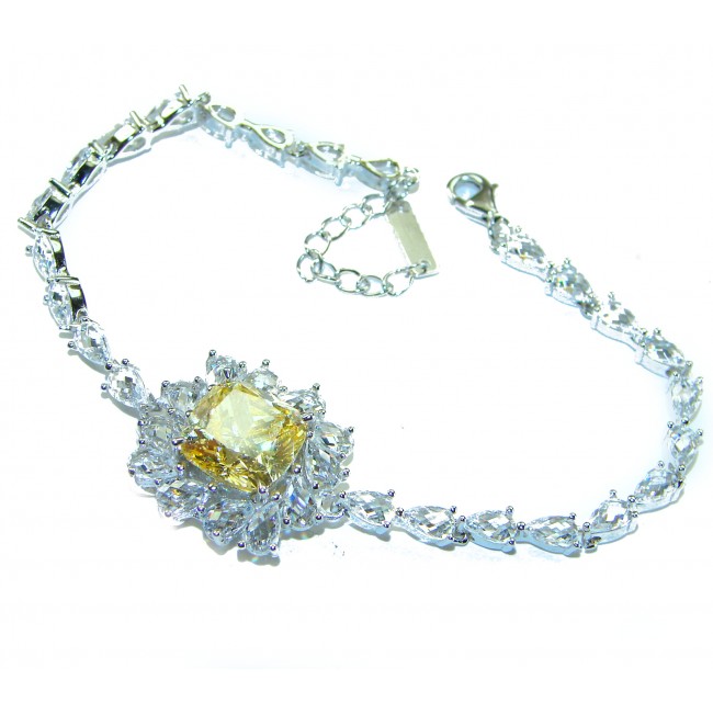 Luxurious 22.5 carat pricess cut Authentic Yellow Sapphire .925 Sterling Silver handcrafted Statement Bracelet - Luxurious bracelet with yellow sapphire and diamonds, top view.