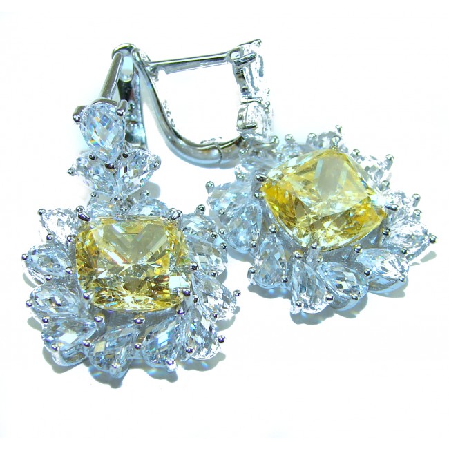 15.5 carat Golden - yellow Montana Sapphire .925 Sterling Silver handcrafted earrings