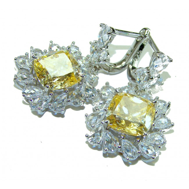 15.5 carat Golden - yellow Montana Sapphire .925 Sterling Silver handcrafted earrings