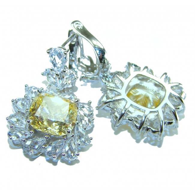 15.5 carat Golden - yellow Montana Sapphire .925 Sterling Silver handcrafted earrings