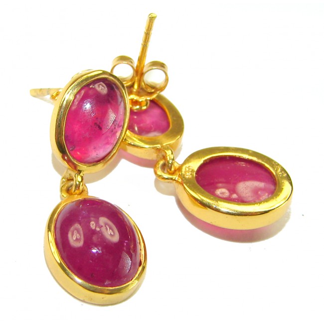 Countless Blessings Genuine 9.5 carat Authentic Mozambique Ruby 18K Gold over .925 Sterling Silver handcrafted earrings - Close-up of gold earrings with oval pink gemstones.