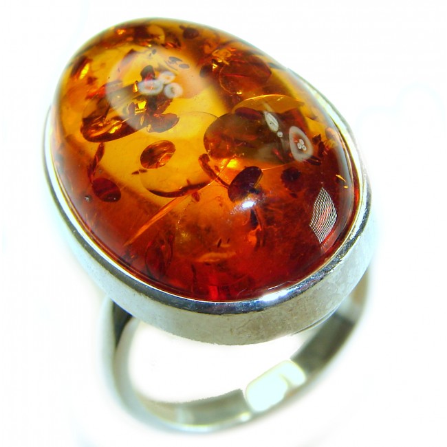 Beauty of the Nature Baltic Amber .925 Sterling Silver handcrafted ring; s. 7 adjustable - Close-up of Baltic amber silver ring showcasing detailed inclusions.