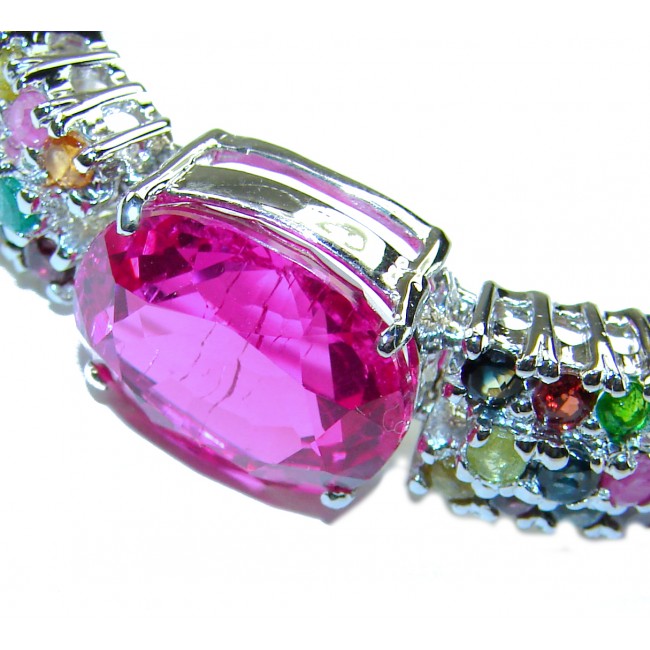 Tiffany - Unapologetically stunning Fuchsia Pink 125.5 carat Pink Sapphire RHODIUM OVER .925 Sterling Silver handcrafted Heavy Bracelet - Close-up of fuchsia pink stone in Tiffany bracelet with colorful gems.