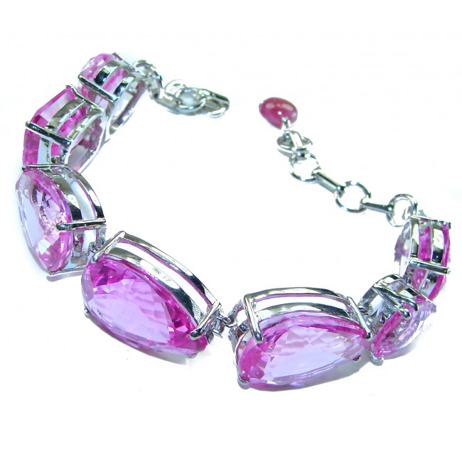 Tiffany - Magnificent Pink 125.5 carat Pink Sapphire .925 Sterling Silver handcrafted Heavy Bracelet - Pink sapphire bracelet, side view, silver setting, chain and clasp visible.