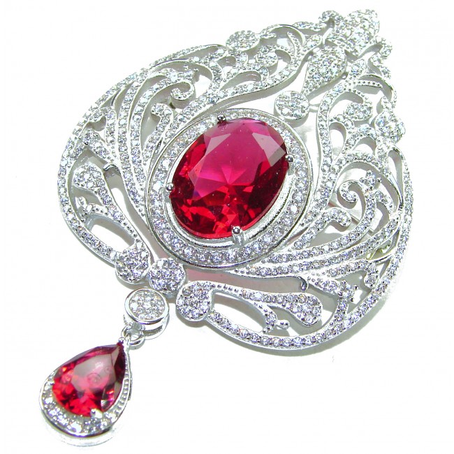 Heirloom Genuine 10.5 carat Kasmir Ruby .925 Sterling Silver handmade Pendant - Brooch - Close-up of ornate heirloom ruby brooch with intricate silver detailing.