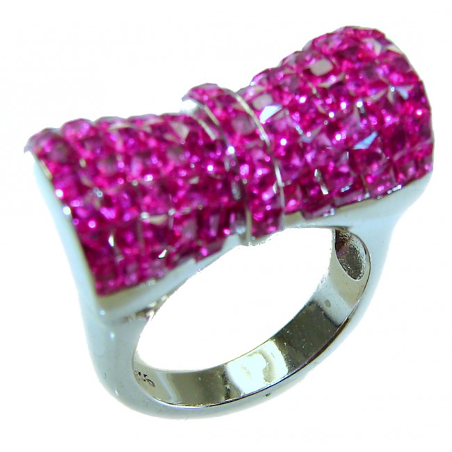 Luxurious Bow - natural 15.5 carat Ruby .925 Sterling Silver handmade Statement Ring size 6 1/2 - Bow ring with pink stones, angled view, sterling silver band.