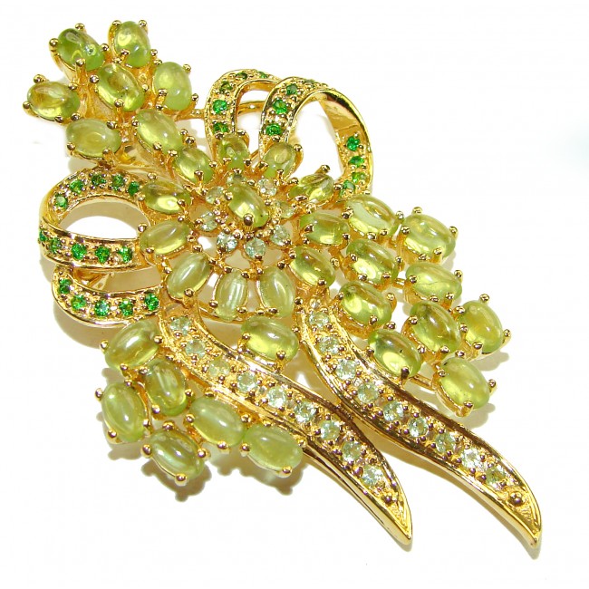 Precious Genuine 65.5 carat Peridot from Egypt .925 Sterling Silver dipped on 18K Gold handmade Pendant - Brooch - Ornate brooch with Egyptian peridot, overhead view showcasing stones.