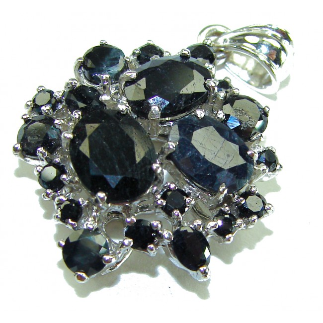 Incredible pear cut 22.4 carat Sapphire .925 Sterling Silver handcrafted pendant - Close-up of sapphire pendant with Sterling silver setting.