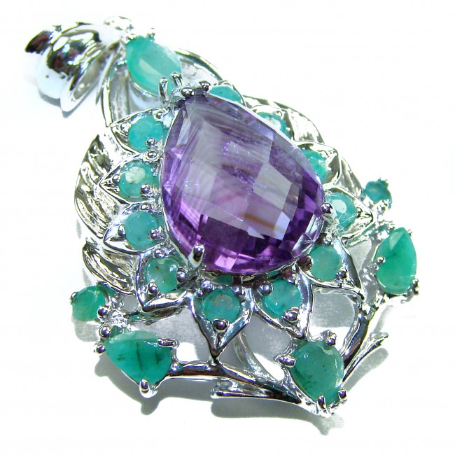Countless Blessings Genuine 15.5 carat Authentic Amethyst Emerald .925 Sterling Silver handmade Pendant - Close-up of amethyst pendant with green stones, showcasing gem details.