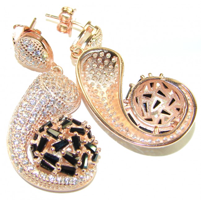 Giovanna - Authentic 22.5 carat Sapphire 18K Rose Gold over .925 Sterling Silver handcrafted earrings - Close-up of rose gold and sapphire earrings with intricate details.