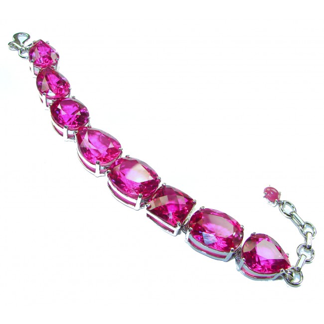 Luxurious 215.8 carat Fuchsia Pink Sapphire .925 Sterling Silver handcrafted Bracelet - Side view of pink sapphire bracelet with clasp detail.