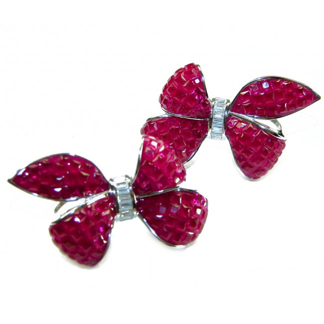 Magnificent Jewel - Bow 25.5 carat Ruby .925 Sterling Silver handcrafted incredible earrings - Close-up of ruby bow earrings in .925 sterling silver