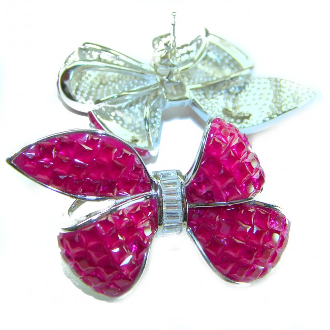 Magnificent Jewel - Bow 25.5 carat Ruby .925 Sterling Silver handcrafted incredible earrings - Close-up of ruby bow jewelry in sterling silver, front and back view.
