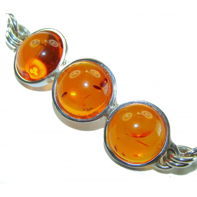 Excellent Baltic Amber .925 Sterling Silver entirely handcrafted Bracelet - Close-up of Baltic amber stones in sterling silver setting.