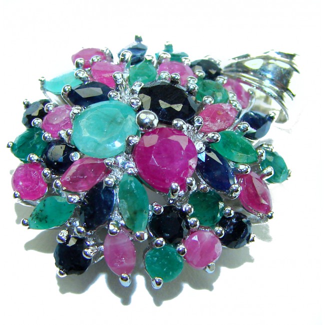 Circle of Life 15.2 carat authentic Sapphire Ruby Emerald .925 Sterling Silver handmade Pendant - Close-up of Circle of Life jewelry with sapphires, rubies, and emeralds.