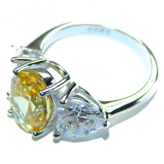Oval cut 6.2 carat yellow Sapphire .925 Sterling Silver brilliantly handcrafted ring s. 6 - Oval cut yellow sapphire ring in side view with sterling silver band.