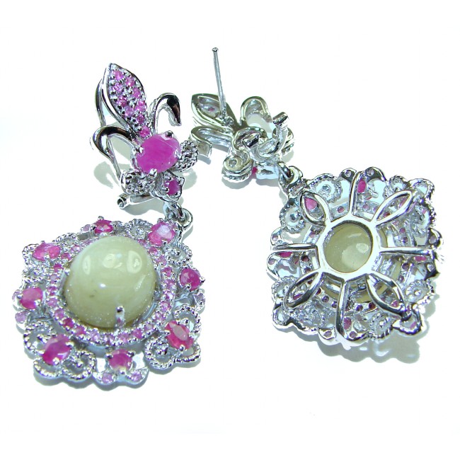 Celtic Spirit authentic fancy cut 22.5 carat Yellow Tourmaline .925 Sterling Silver handcrafted Statement earrings - Fancy earrings with yellow tourmaline and pink stone detail, angled view.